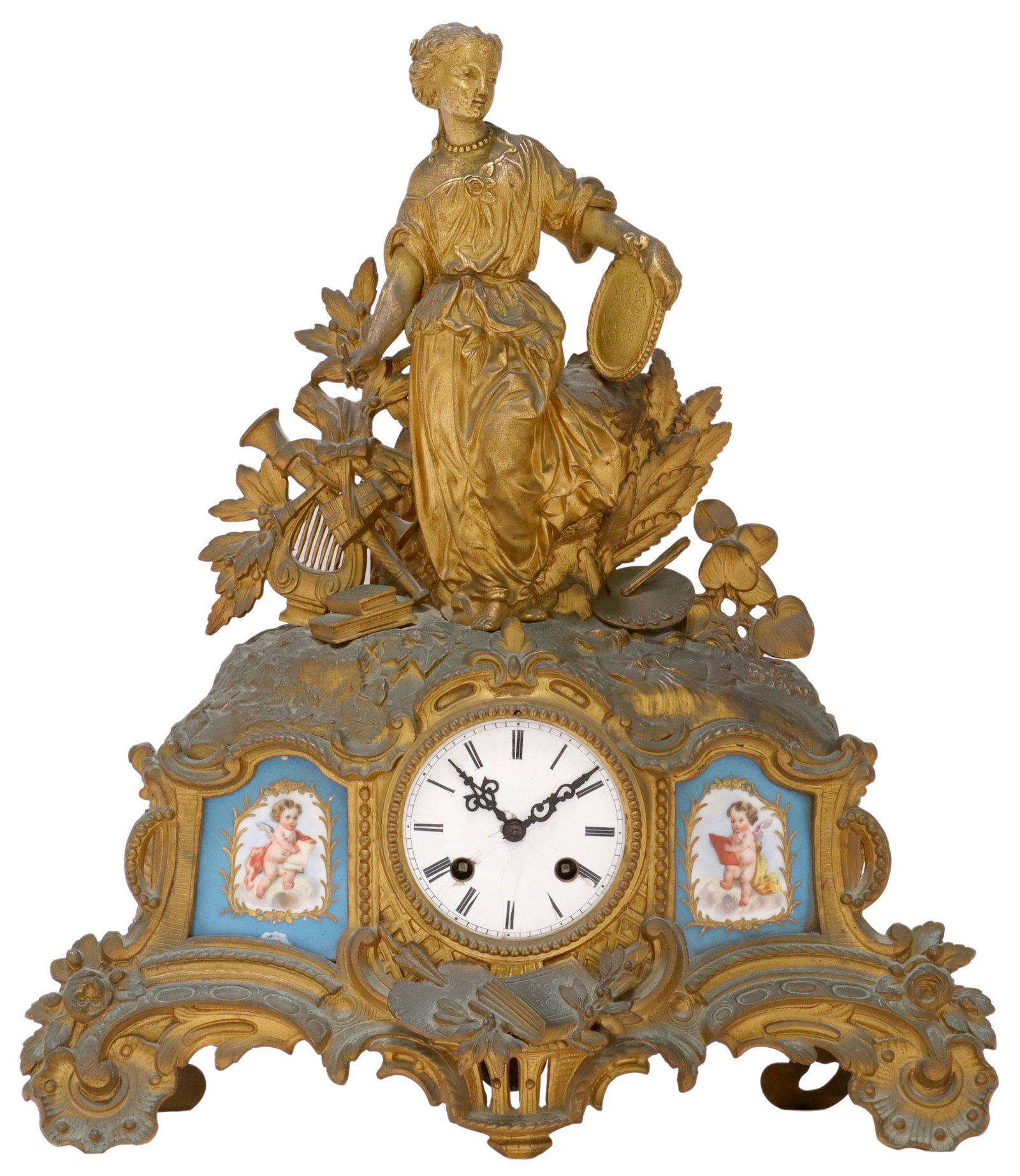 FRENCH GILT METAL FIGURAL MANTEL SHELF CLOCK: French gilt metal mantel shelf clock, 19th c., allegorical female figure representative of the arts, over white enamel dial with Roman numeral hour markers, flanked by painted porcelain plaques with p