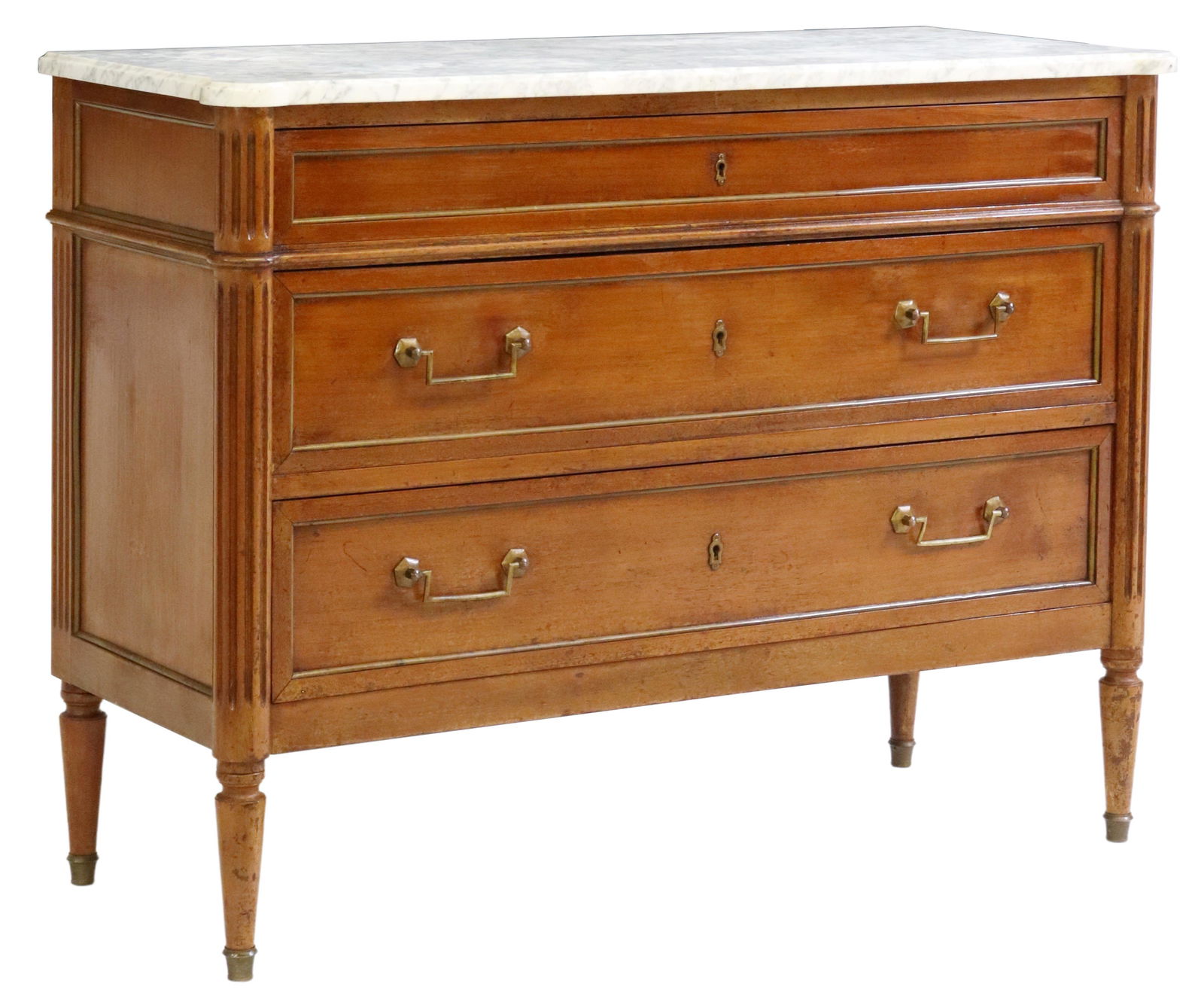 FRENCH LOUIS XVI STYLE MARBLE-TOP COMMODE: French Louis XVI style commode, early 20th c., having shaped marble top, over three paneled drawers with gilt metal trim, flanked on both sides by fluted corner posts, rising on tapered legs, ending i