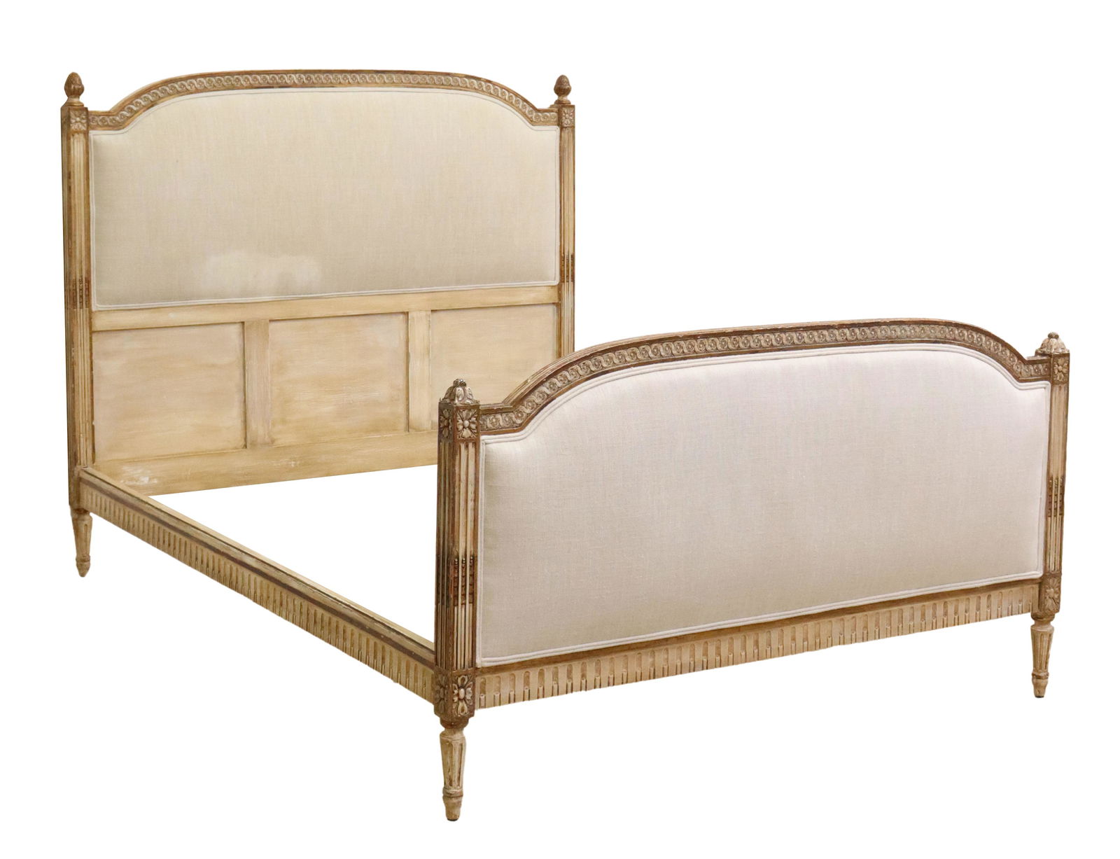 FRENCH LOUIS XVI STYLE PAINTED & UPHOLSTERED BED: French Louis XVI style bed, early 20th c., wood frame in a distressed painted finish, upholstered headboard and footboard, rising on tapering fluted legs, could likely accommodate a full-size mattress