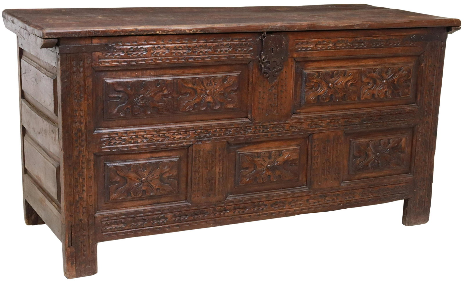 LARGE FRENCH CARVED OAK COFFER/ TRUNK, 18TH C.: French carved oak coffer/ storage trunk, 18th c., having hinged lid, opening to storage interior, front carved with florals and running ornamentation, rising on integral block legs, lacking lock and f