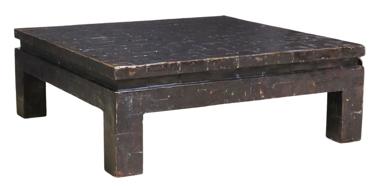 MAITLAND-SMITH PATCHWORK SHEET METAL COFFEE TABLE: Maitland-Smith square coffee table, late 20th c., wood frame, with overlaid patchwork sheet metal design, rising on block legs, approx 18"h, 50"sq Start Price: $150.00
