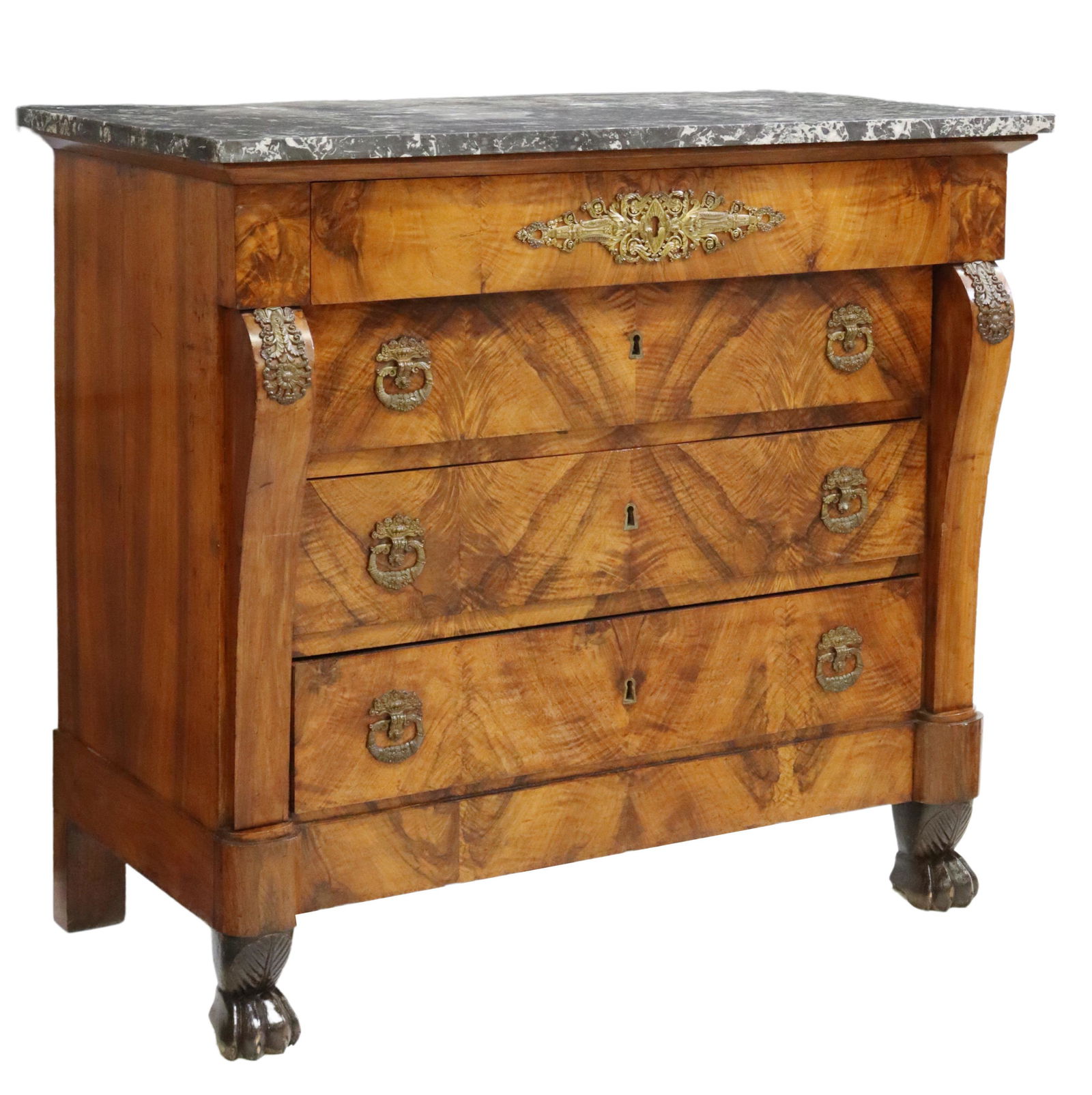FRENCH EMPIRE STYLE MARBLE-TOP WALNUT COMMODE: French Empire style walnut commode, 19th c., having marble top, frieze drawer, over three additional drawers, flanked by curved side supports, applied gilt metal accents, rising on paw feet, approx 37