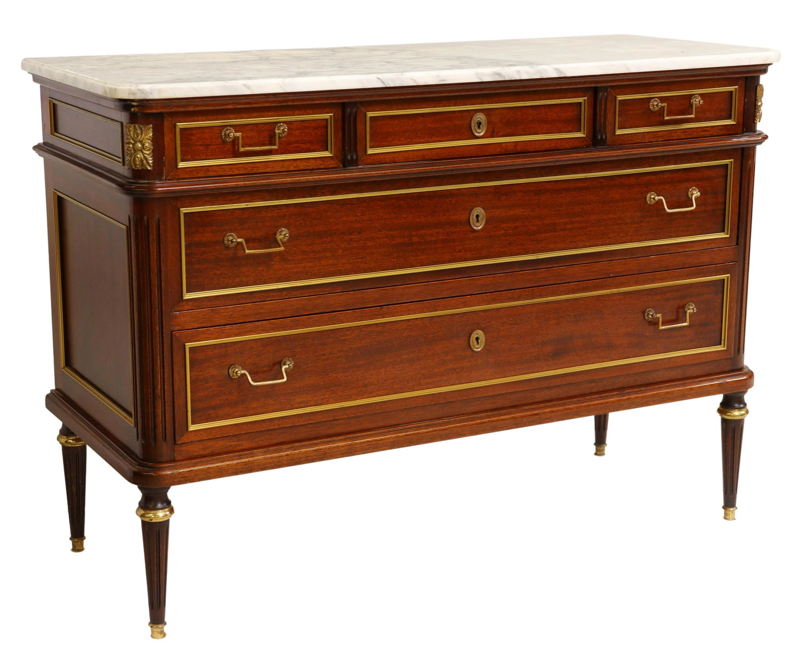 FRENCH LOUIS XVI STYLE MARBLE-TOP MAHOGANY COMMODE: French Louis XVI style mahogany commode, 20th c., having marble top, case fitted with three top drawers, over two full-length drawers, gilt metal trim, rising on fluted tapered legs, ending on capped