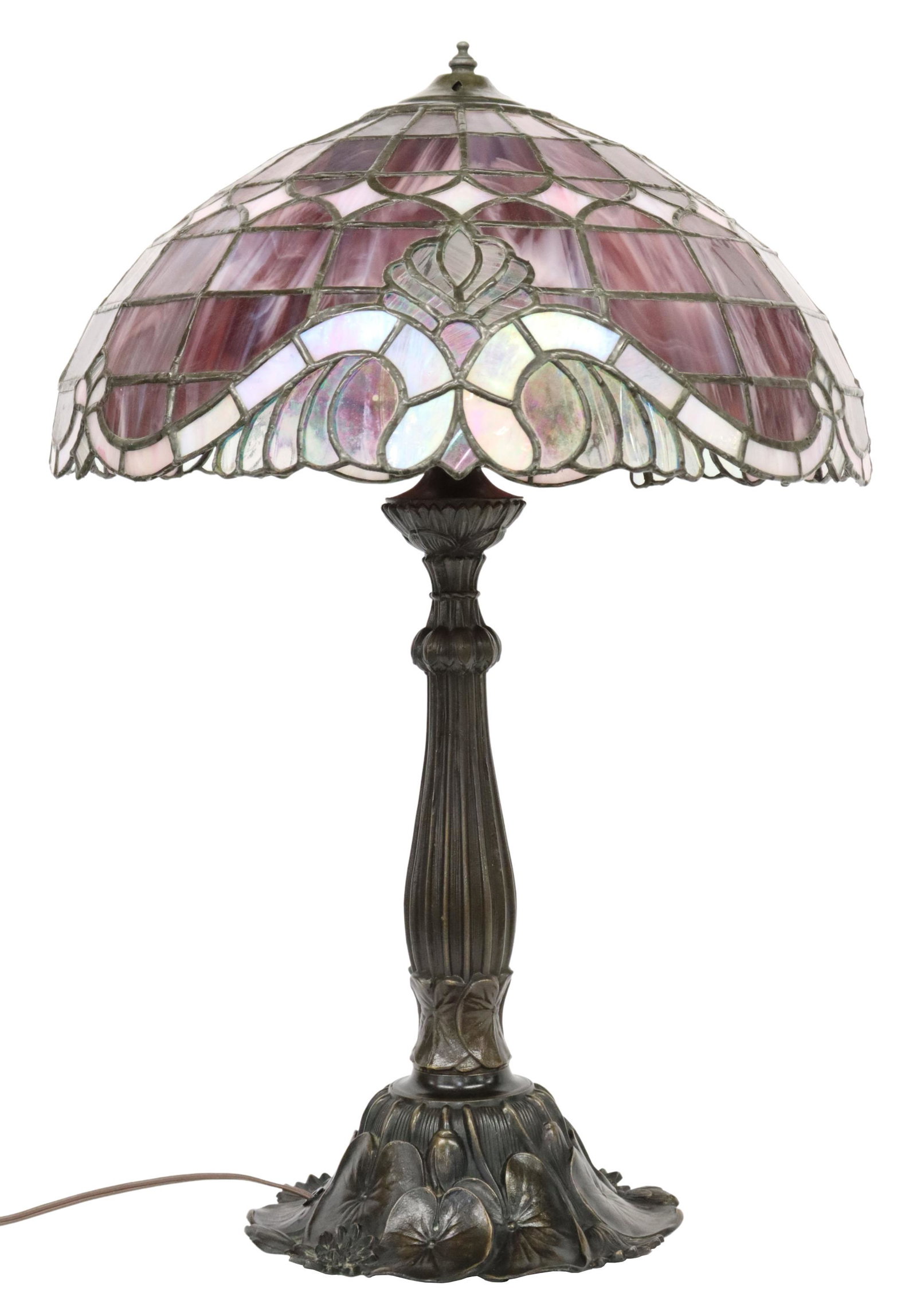 TIFFANY STYLE STAINED & LEADED GLASS LILY PAD LAMP: Tiffany style stained and leaded glass table lamp, late 20th c., iridescent and purple slag glass dome shade, on a patinated metal lily pad base, overall: approx 24"h, 16.25"diam, 10.5lbs Start Price: