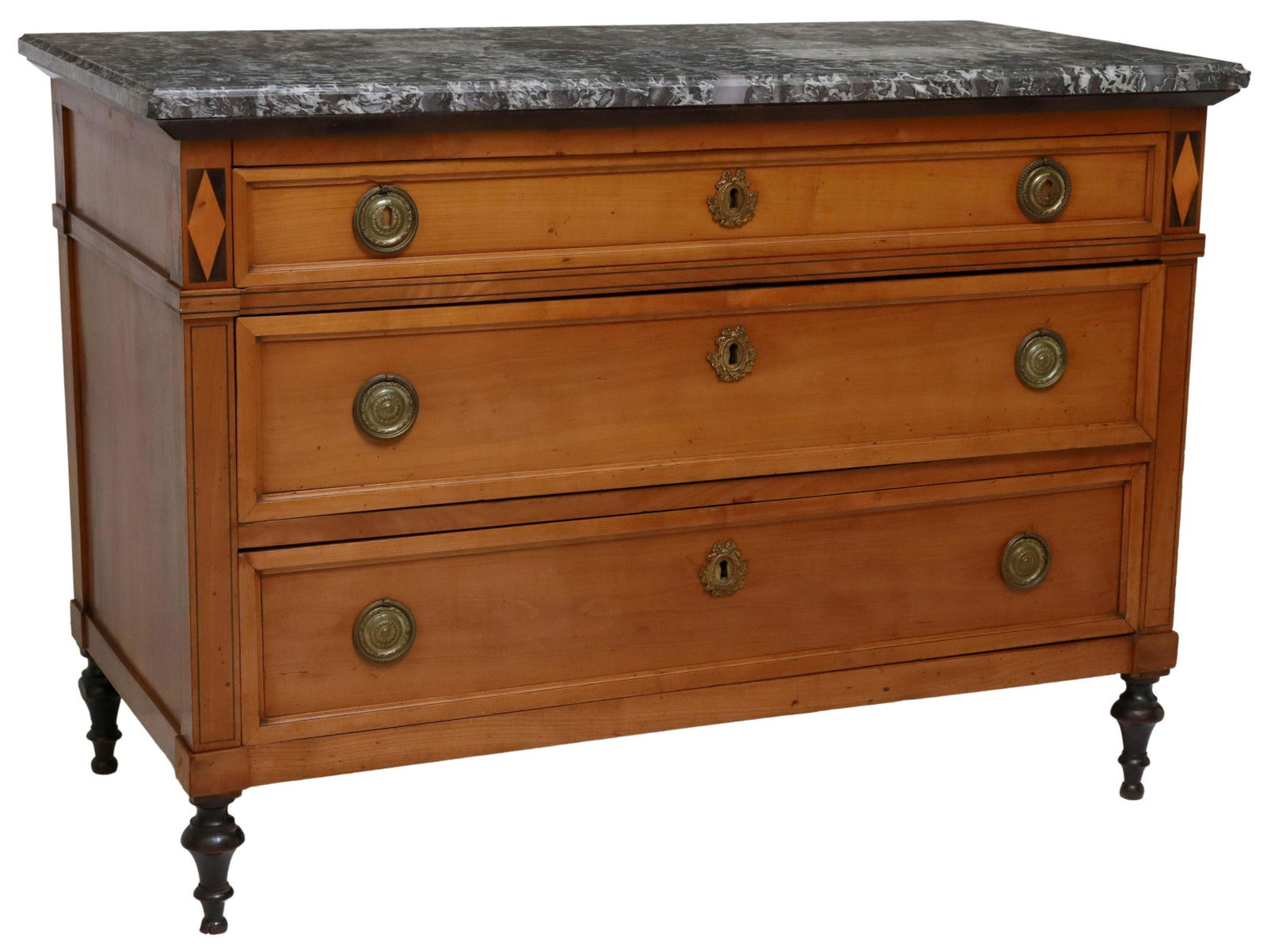 FRENCH MARBLE-TOP FRUITWOOD & EBONIZED COMMODE: French marble-top fruitwood commode, 19th c., case with ebonized parquetry accents and trim, fitted with three drawers, rising on turned legs, marble top intact with overall restorations, approx 36.25