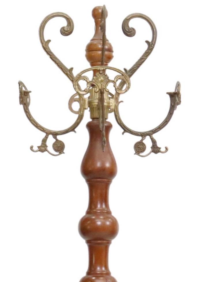 ITALIAN TURNED & GILT METAL CARYATID HALL TREE: Italian carved hall tree, 20th c., four scrolling hooks, with shell-from terminals, over turned standard, rising on patinated gilt metal caryatid tripartite base, approx 70.5"h, 18"sq Start Price: $10