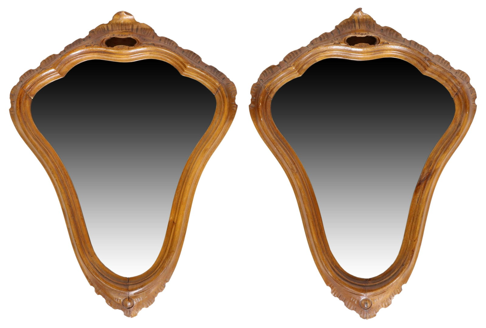 (2) ITALIAN VENETIAN CARVED WALNUT WALL MIRRORS: (pair) Italian Venetian walnut wall mirrors, 20th c, having carved foliate crest, over shaped frame, encasing flat mirror plate, some light silver loss to both, approx 15.25"h, 11"w, 3.75lbs total Sta