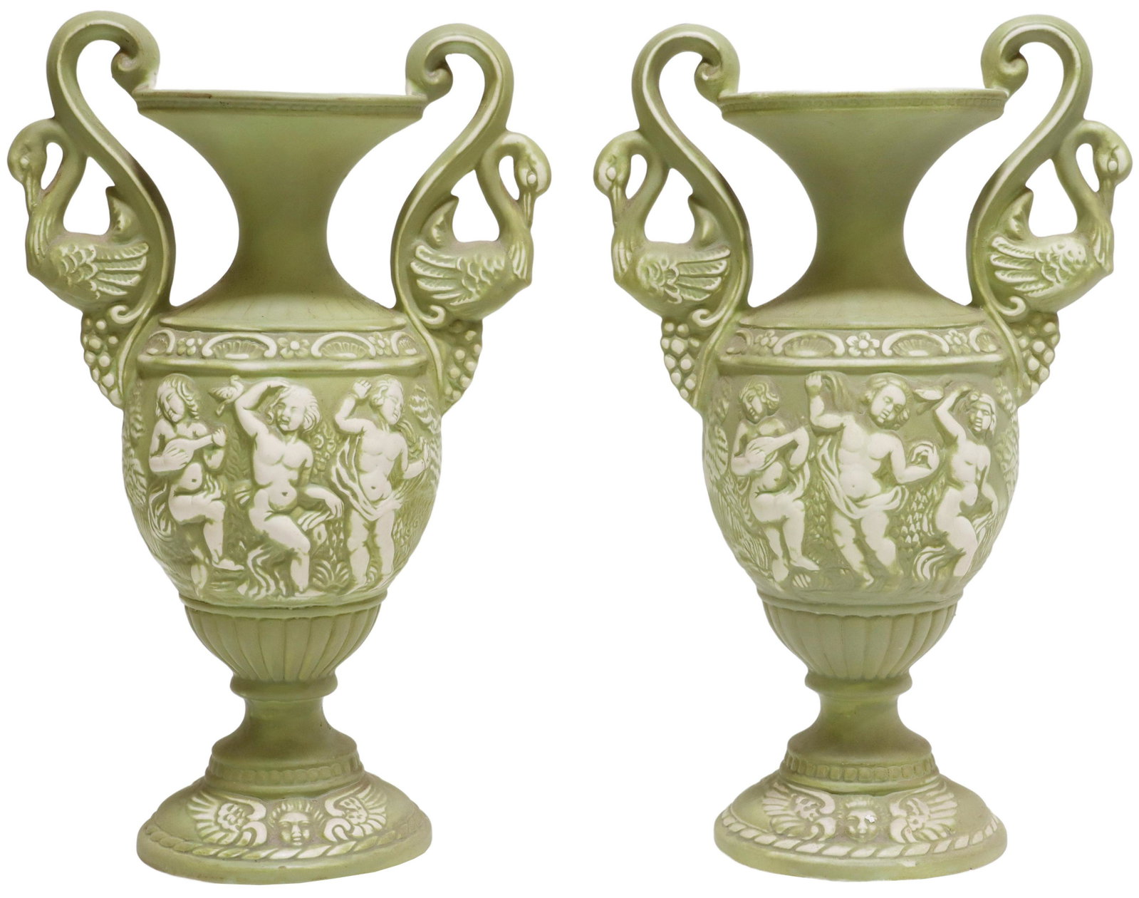 (2) NEOCLASSICAL STYLE BISCUIT PORCELAIN VASES: (pair) Neoclassical style biscuit porcelain amphora-form vases, mid 20th c., scroll handles with swan terminals, body with putti in relief, rising on a pedestal foot, approx 16.25"h, 10.25"w, 6"d; 6lb