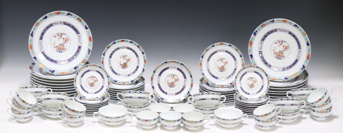 (81) RAYNAUD 'KOUTANI' PORCELAIN DINNER SERVICE: (lot of 81) French Limoges porcelain partial dinner service, Raynaud, in the "Koutani" pattern (white), having floral designs, parcel gilt accents, including: (16) dinner plates, approx 10.75"diam; (1