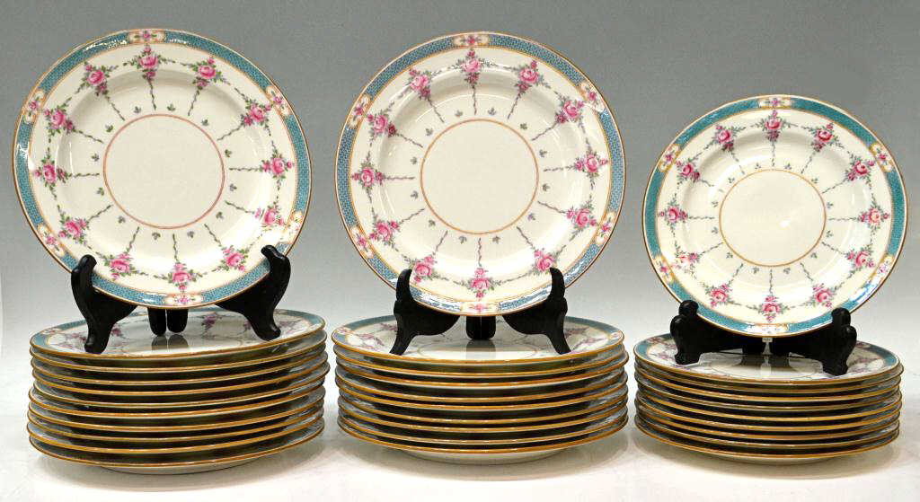 LARGE SET FINE MINTONS PORCELAIN DINNER PLATES: (set of 31) Minton porcelain service plates, polychrome floral decoration with raised enamel accents, enclosed by a fish scale border, c. 1873-1912, comprising: (10) salad plates, 9"d; (21) dinner pla
