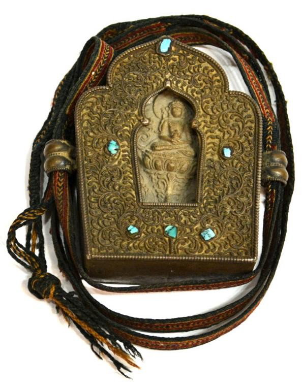 19TH C TIBETAN PORTABLE METAL SHRINE (GAU): Tibetan portable metal shrine (gau) with a terracotta votive table (tsa-tsa), 19th c., with the characteristic trefoil-shaped top and beaded borders on the edge and framing the central aperature of si