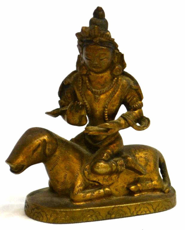 ANTIQUE ASIAN GILT BRONZE BUDHIST DIVINITY: Antique Mongolian or Bhutanese gilt bronze figure of bodhisattva, the Buddhist divinity seated on a recumbent sheep raised on an oval plinth, 2"h, 2.5"w, .75lb **Provenance: From the collection of Jal