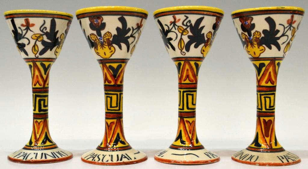 (4) SPANISH FAIENCE DECORATED CERAMIC GOBLETS: ( lot of 4) Spanish faience decorated ceramic goblets, marked underfoot as shown, made in Valencia, scribed Facuno Pascual around the base, some chipping rim wear/chips, approx 7"h x3.25"d, 1.75lbs to