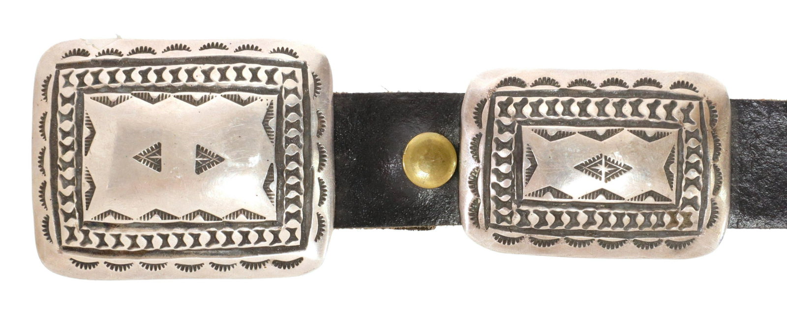 SOUTHWEST STAMPWORK STERLING SILVER CONCHO BELT: Southwest sterling silver concho belt, signed BB, buckle and eleven conchos with stampwork, on a black leather belt, rough-cut slits/holes, belt: approx 33"l (buckle catch to first hole), 36"l (buckle