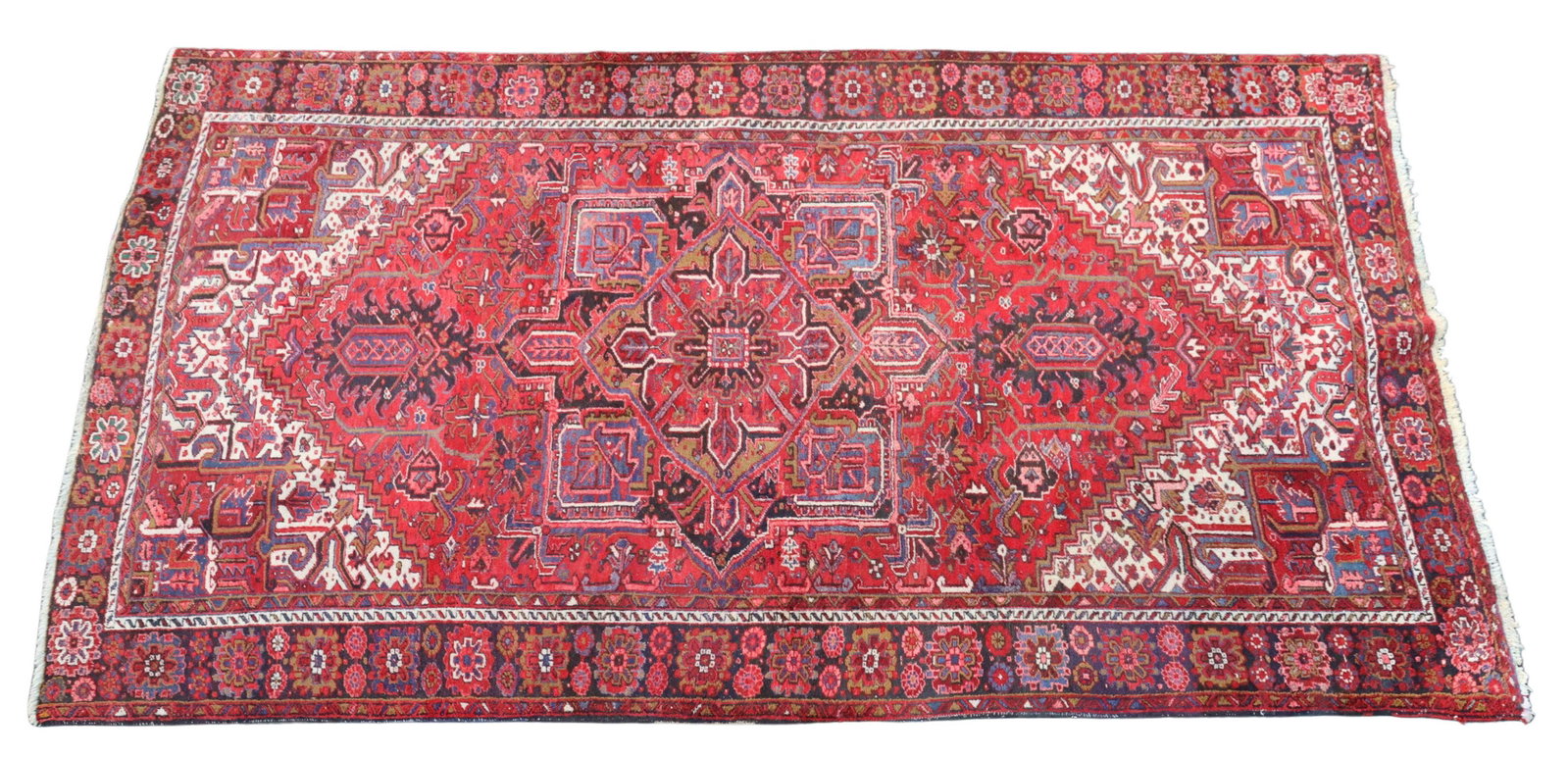 HAND-TIED PERSIAN HERIZ RUG, 12'7" X 8'5": Hand-tied Persian Heriz rug, approx 12'7"l, 8'5"w **Provenance: From the estate of Margaret "Candy" Becker (Austin, Texas 1942-2022). She was an artist in all areas of her life who created art in many