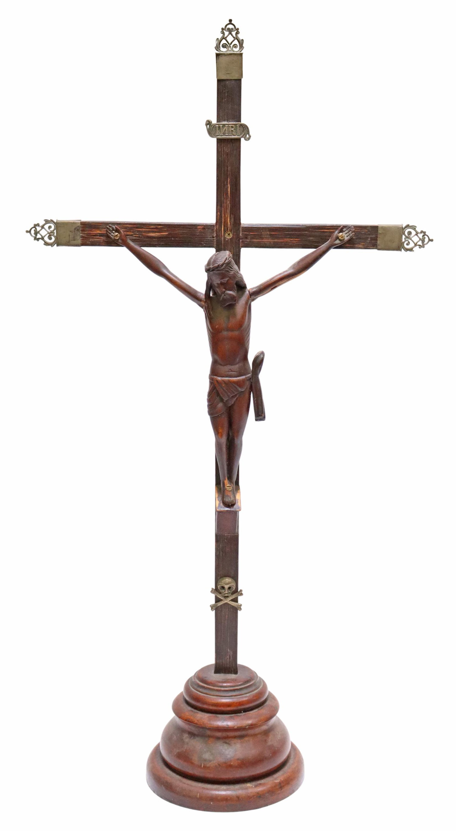 RELIGIOUS CARVED WOOD TABLETOP ALTAR CRUCIFIX, 36": Carved wood crucifix, cross with silver-tone metal terminals, on a domed base, visible seams at arms, approx 36.5"h, 18.5"w, 8"d, 4.5lbs **Provenance: From the estate of Margaret "Candy" Becker (Austi
