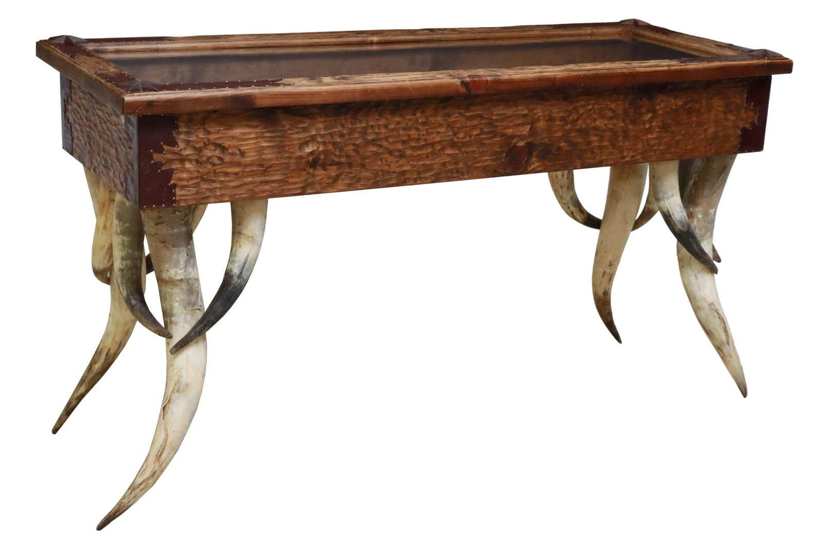 WESTERN WOOD & HORN DISPLAY CASE CONSOLE TABLE: Western display console table, textured wood hinged lid, accented with leather and iron stars, centering glazed top, opening to cowhide lined interior, rising on cow horn legs, approx 35"h, 66.5"w, 23