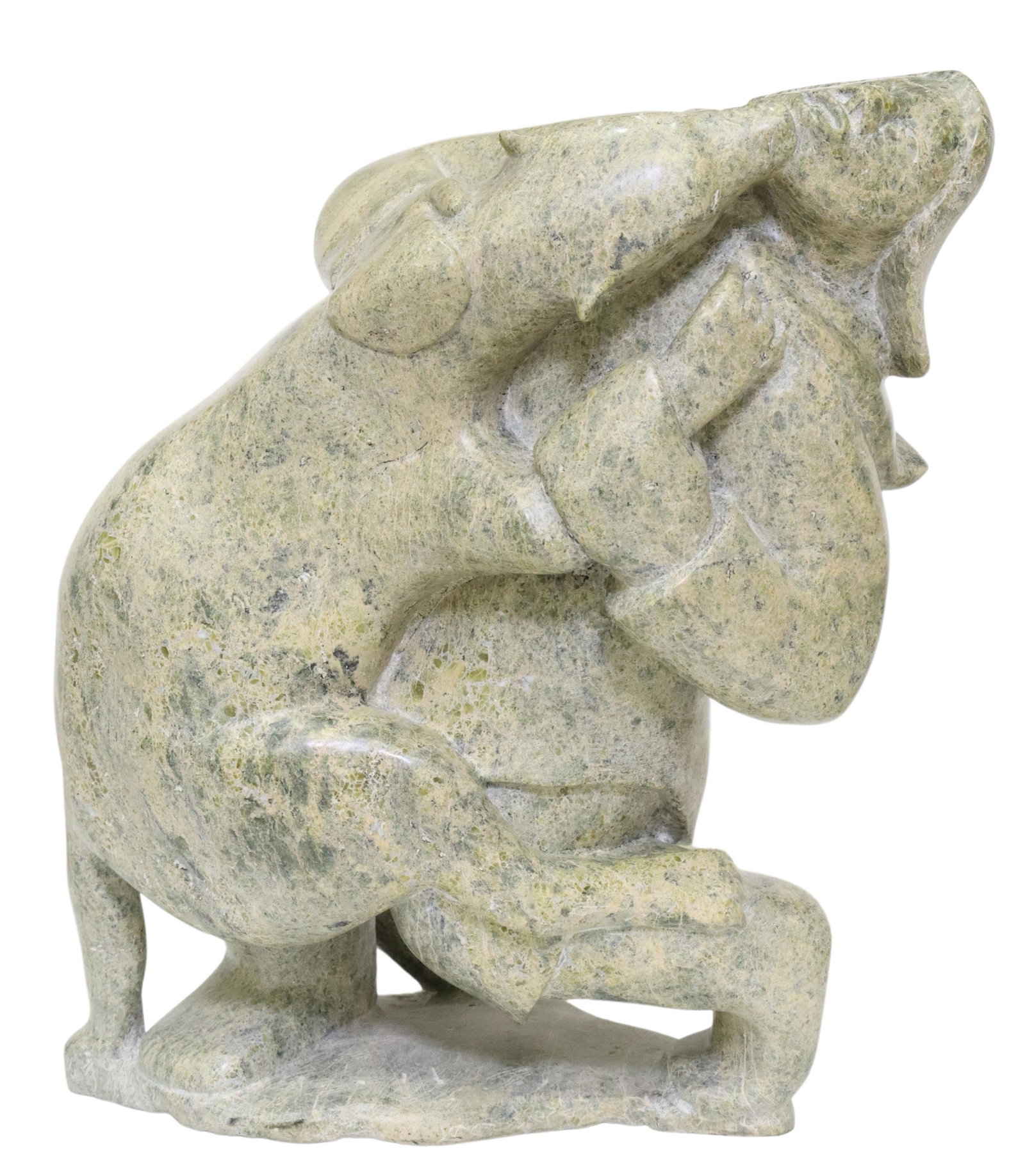 QAVAROAK TUNNILLIE (D.1992) INUIT CARVED SCULPTURE: Inuit carved hardstone sculpture, "Man and Wolf," attributed to Qavaroak Tunnillie (Cape Dorset (Kinngait), Canada, 1928-1992), unsigned, accompanied by Certification of Authenticity issued by Inuit A
