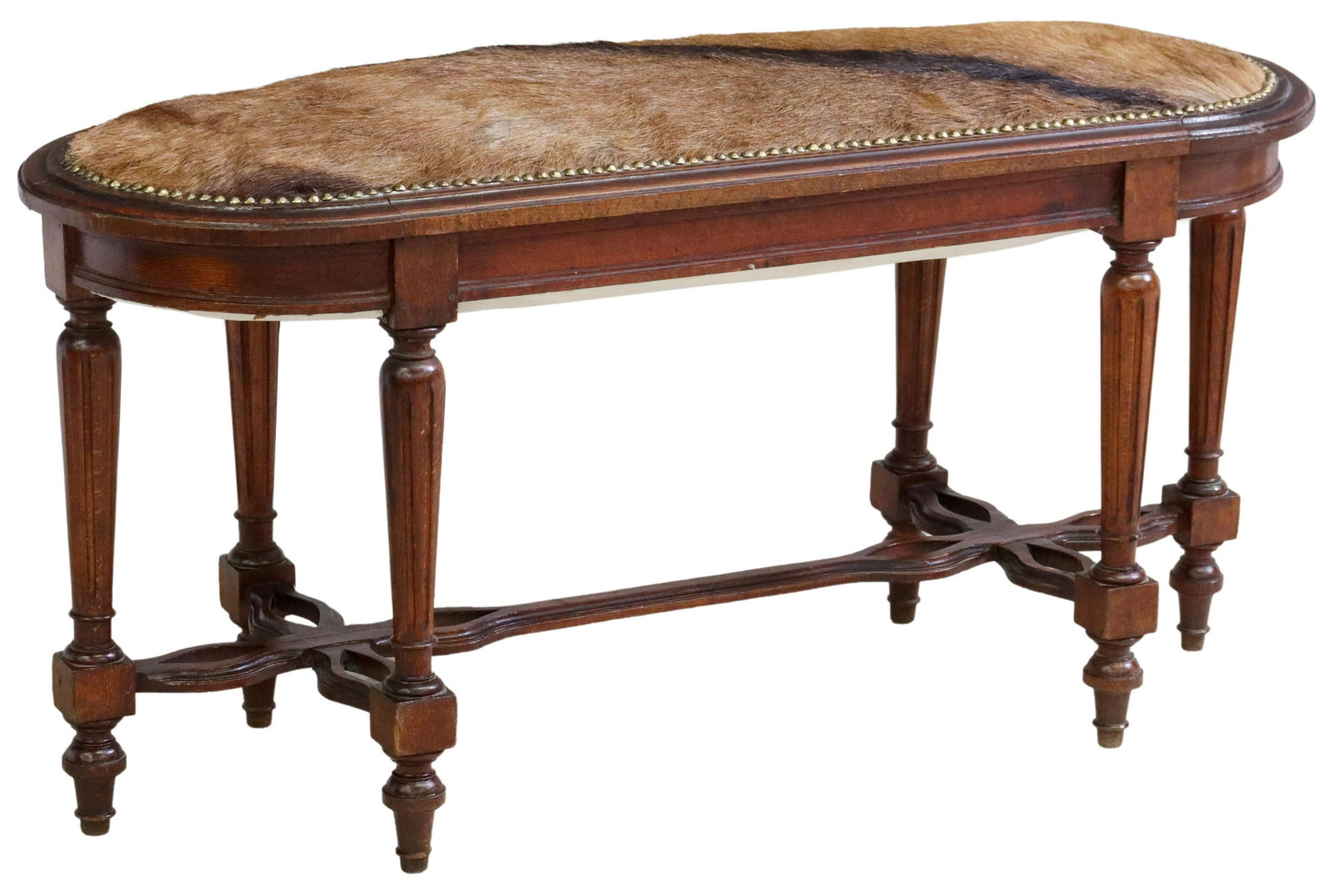 LOUIS XVI STYLE COWHIDE UPHOLSTERED BENCH: Louis XVI style bench, 20th c., ovular form, cowhide upholstered seat, with nailhead trim, rising on fluted and tapered legs, joined with shaped cross stretcher, rising on blunt arrow feet, approx 19"