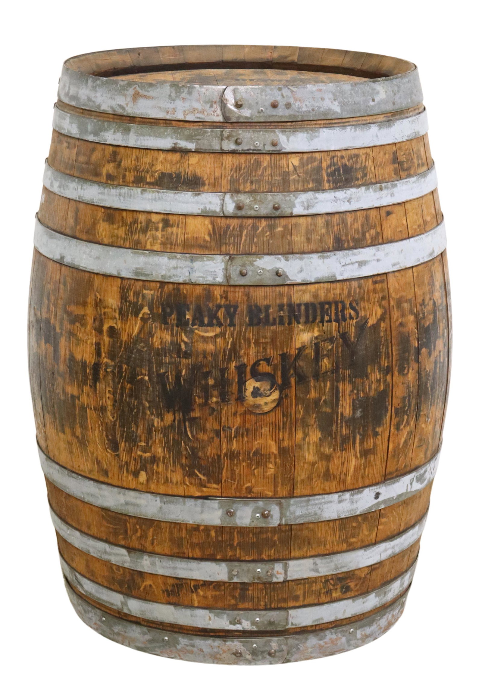 PEAKY BLINDERS IRISH WHISKEY OAK STAVE BARREL: Oak stave barrel/ keg, with iron banding, stenciled "Peaky Blinders Irish Whiskey, bottled for Shelby Bros., Birmingham," approx 38"h Start Price: $200.00