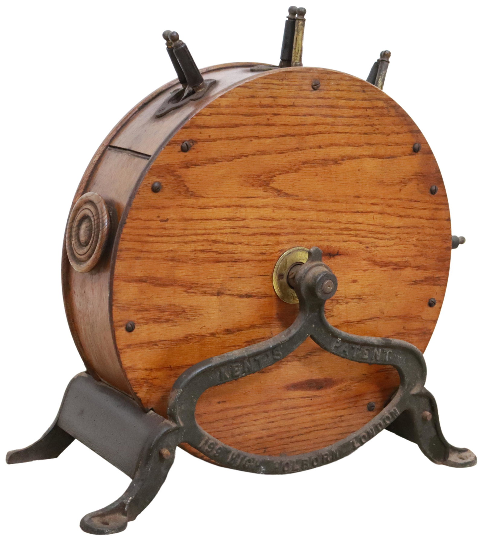 ENGLISH GEORGE KENT LTD. CRANK KNIFE SHARPENER: English oak and iron knife sharpener, George Kent Limited, late 19th c., oak sharpening wheel, with hand-crank, rising on cast iron base, approx 19.5"h, 19.75"w, 17"d Start Price: $80.00
