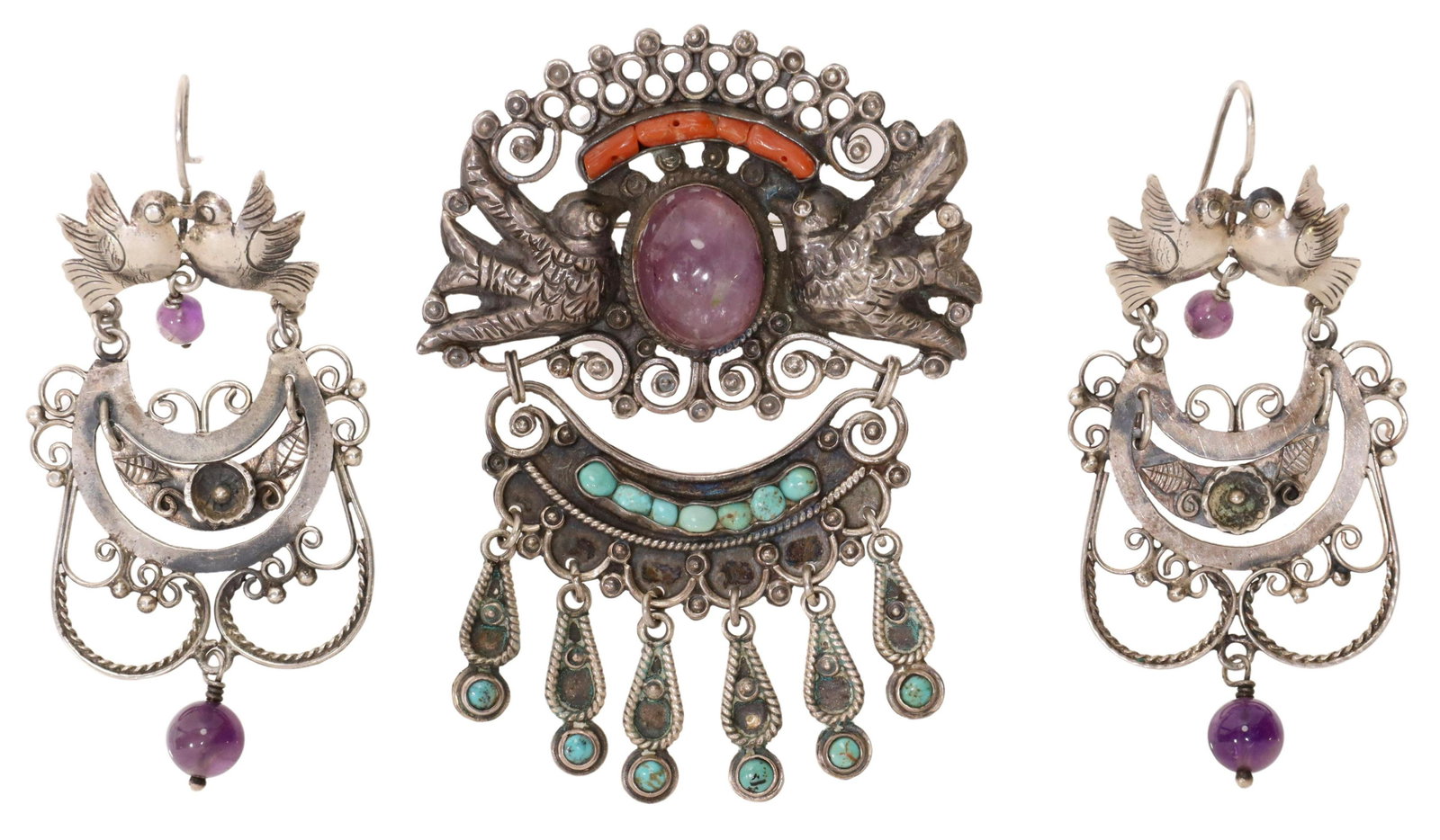 (LOT) MEXICO STERLING & AMETHYST BIRD JEWELRY: (lot) Estate silver jewelry group, Mexico, including: (1) brooch, in the manner of Matilde Poulat (Mexican, d.1960), two birds flank an amethyst cabochon, openwork design set with red coral and turquo