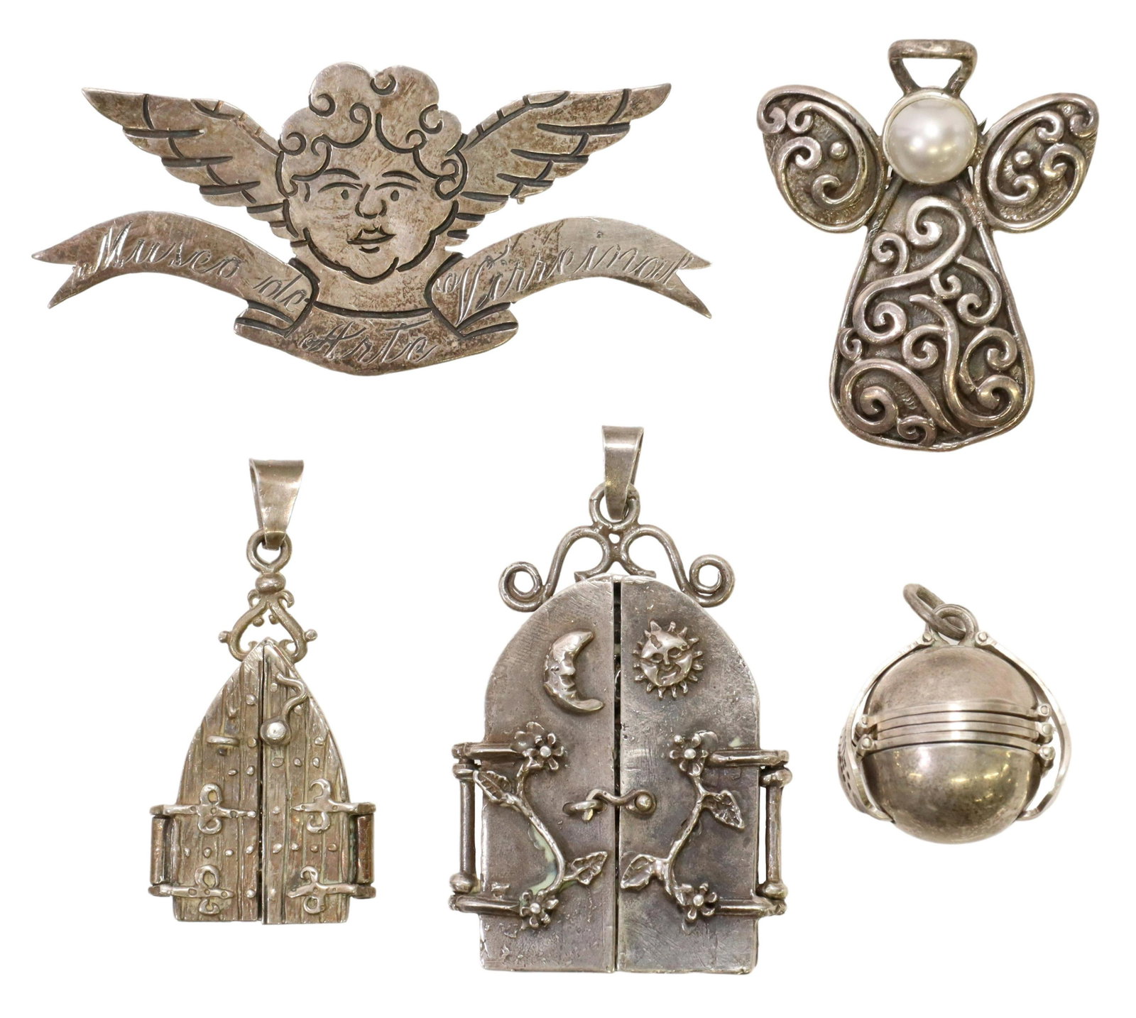 (5) MEXICO 925 JEWELRY, NICHO PENDANTS, ETC: (lot of 5) Estate 925 sterling silver pendant and brooch group, most likely Mexico, including: (2) nicho/shrine pendants, (one) opening to Adam and Eve, (one) opening to the Blessed Virgin, largest: a