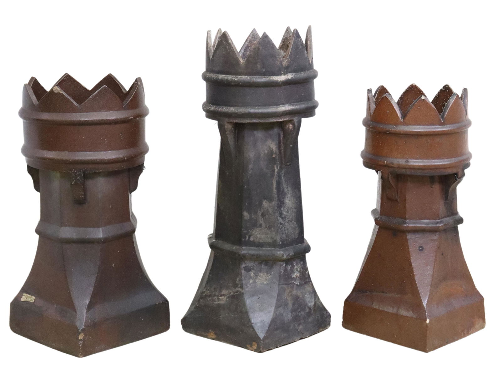(3) ENGLISH ARCHITECTURAL EARTHENWARE CHIMNEY POTS: (lot of 3) Architectural English earthenware chimney pots, turret-form, with smoke vents, largest: approx 34.5"h, 12.25"sq **PLEASE NOTE: All of the cast stone and garden pieces in this auction have i