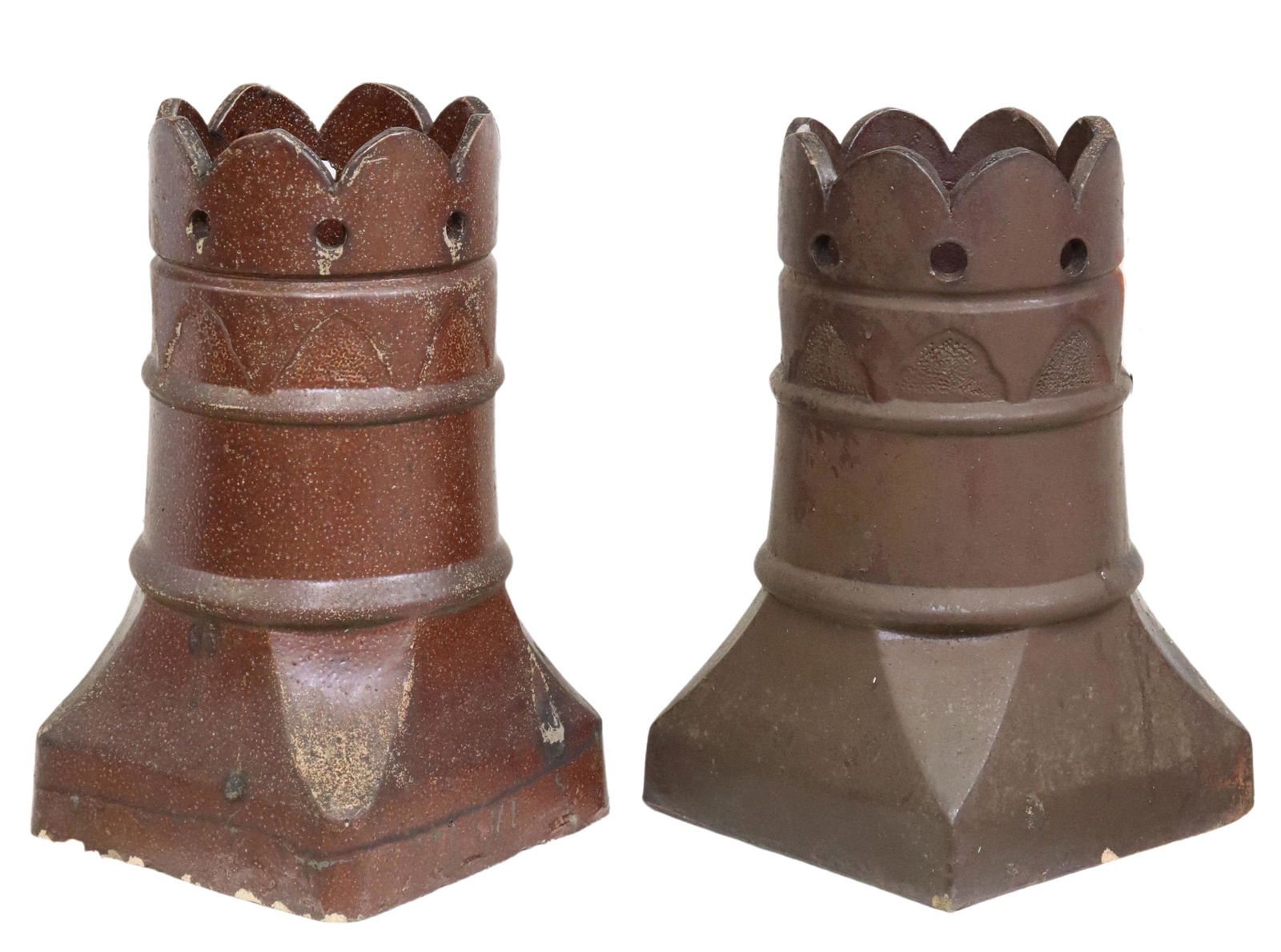 (2) ENGLISH ARCHITECTURAL EARTHENWARE CHIMNEY POTS: (lot of 2) Architectural English earthenware chimney pots, scalloped top, over cylindrical form, rising on squared base, in slightly varied designs, largest: approx 21.75"h, 13.25"sq Start Price: $200
