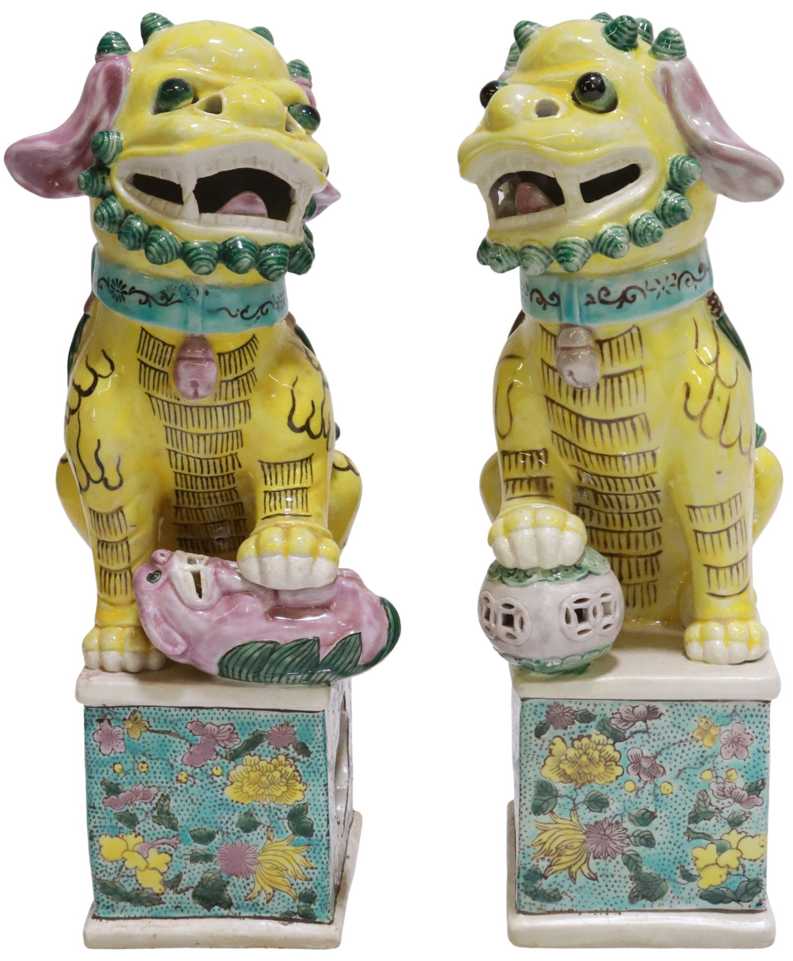 2) CHINESE FAMILLE ROSE PORCELAIN FOO LION CENSERS: (lot of 2) Chinese famille rose porcelain foo lion censers/ incense burners, one with ball, one with cub under paw, central hole for incense, rising on square pedestal bases, approx 12"h, 5"w, 6"d, 7l