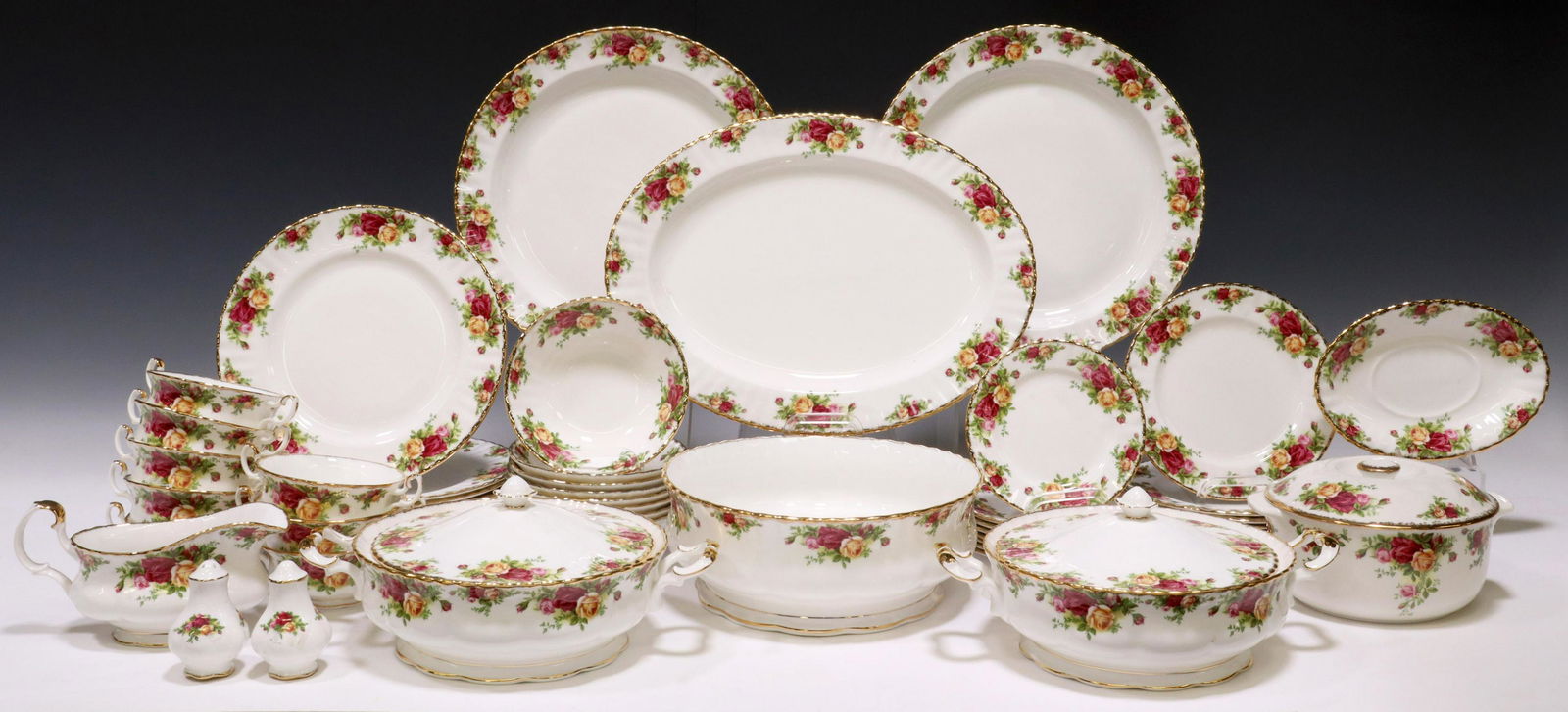 (51) ROYAL ALBERT OLD COUNTRY ROSES DINNER SERVICE: (lot of 51) Royal Albert bone china dinner service, in the "Old Country Roses" pattern, with gilt rim, including: (8) dinner plates, approx 10.5"diam; (8) salad plates, approx 8"diam; (8) bowls, appro