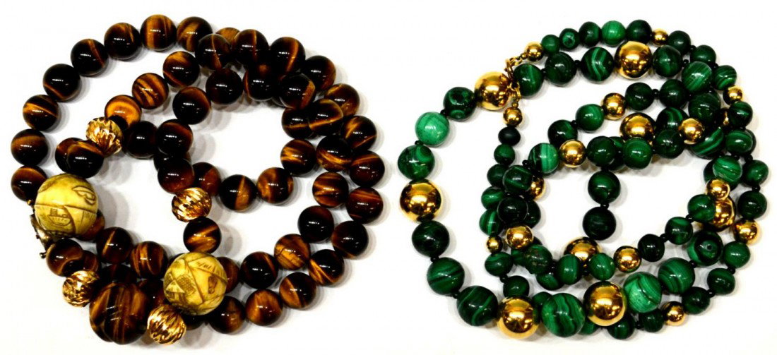 ASIAN INSPIRED CATS EYE & MALACHITE NECKLACES: **This lot will not be shipped Internationally** (lot of 2) Ladies beaded necklaces: (1) fashioned with malachite beads of graduated size, spaced with assorted gold tone beads, clasp marked 14kt gf, s