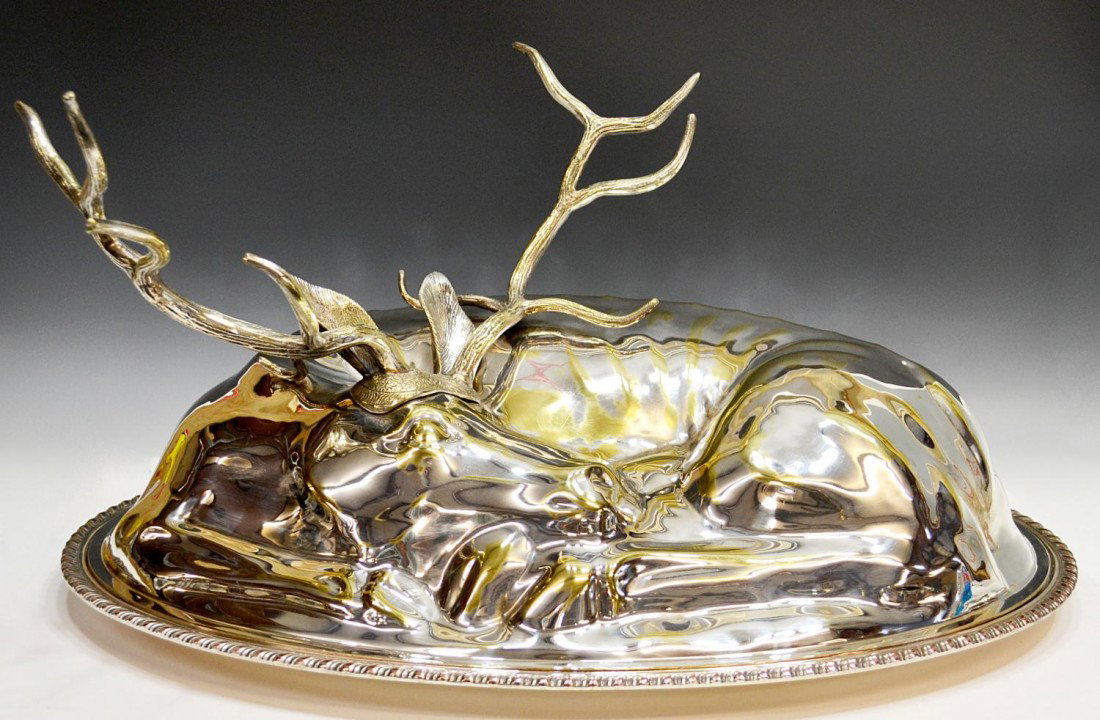 MONUMETAL DEER FORM MEAT COVER & SERVICE PLATTER: Monumental silver plate lidded service platter, the oval tray with gadrooned rim surmounted by a cover in the form of a recumbent deer, loss of plate as pictured, 13"h, 27"l, 17.5"w, 15lbs total Start