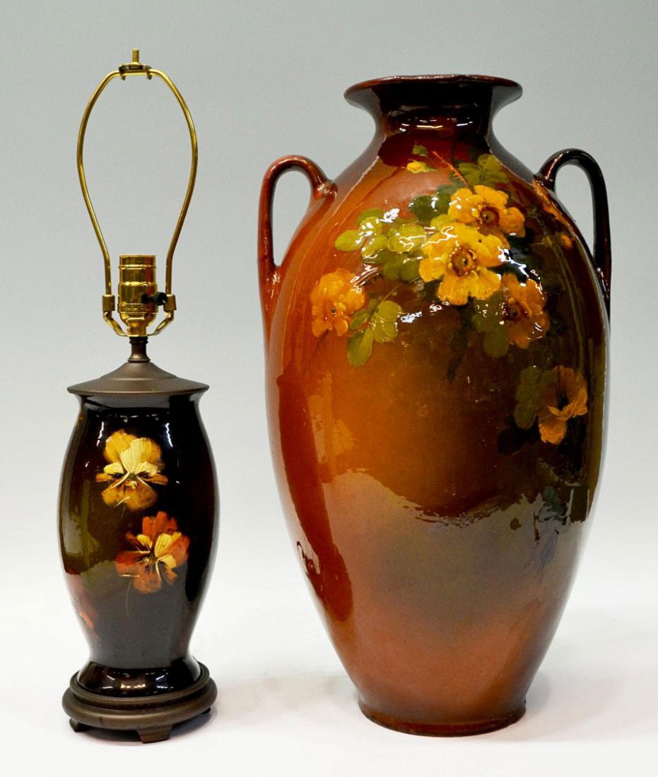 (2) LARGE LOUWELSA WELLER VASE & WELLER LAMP: (lot of 2) Weller art pottery: (1) Louwelsa floral decorated lamp made with a 10"h vase, overall: 22.5"h, 5"d; (1) large Louwelsa amphora form floral decorated vase, restoration at handles and rim, ch