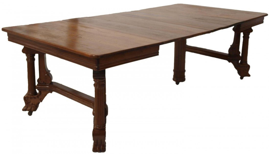 ANTIQUE AMERICAN CHERRY WOOD DINING TABLE, 96": American cherrywood dining table, late 19th c., a square top with four 12" leaves opening to 96", resting on turned and ribbed legs at each corner joined by elaborate stretchers, a fifth leg at center