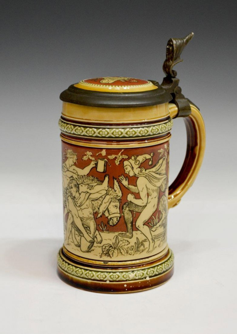METTLACH BEER STEIN, #2035, BACCHUS: Mettlach Beer stein, form number 2035, Germany, 1898, decorated with figural bacchanalian scenes, 3/10liter size, 7"h, 4.5"w, 3.5"d, 1lb Start Price: $100.00