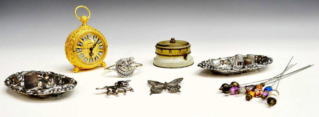 STERLING SILVER, VINTAGE CLOCK, ART GLASS HATPINS: (lot of 18) Collectible group: (6) Art glass & bead hat pins; (3) sterling silver jewelry comprising cuff bracelet with horse head, figural female butterfly brooch, unicorn pin; (5) metal thimbles; 2)
