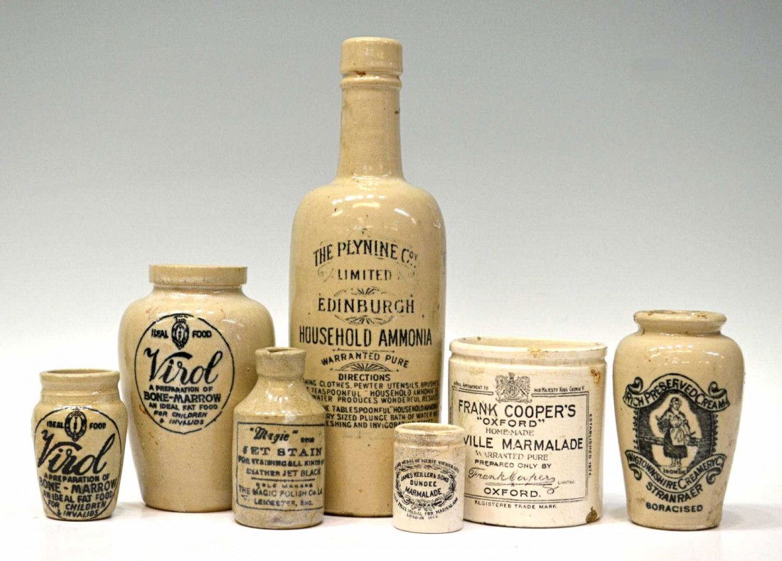 COLLECTION OF ANTIQUE EARTHENWARE BOTTLES: (lot of 7) Collection of antique earthenware bottles, various pieces include, Virol Bone Marrow, The Plynine Co. Edinburgh Household Ammonia, etc., some chipping and loss throughout, largest: 10.5"h,