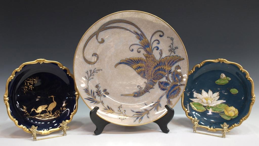 COLLECTION FINE ROSENTHAL GILDED PORCELAIN PIECES: Collection of Rosenthal gilded porcelain tableware including: (2) 'Pompadour' hand painted compotes, one in green with gilded water lilies, the other deep blue with gilded cranes and trim, marks as pi