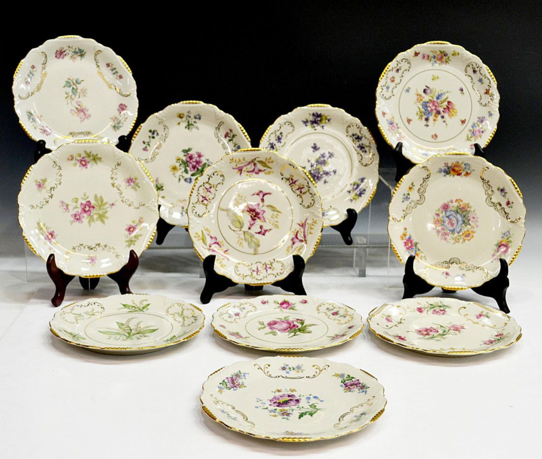 (11) WINTERLING ROYAL HEIDELBERG FLORAL PLATES: (lot of 11) German gilt and floral decorated plates bearing the German Bavaria mark of Royal Heidelberg by Winterling Porcelain, a different flower represented on each plate, 7.75"d, total: 6lbs Start