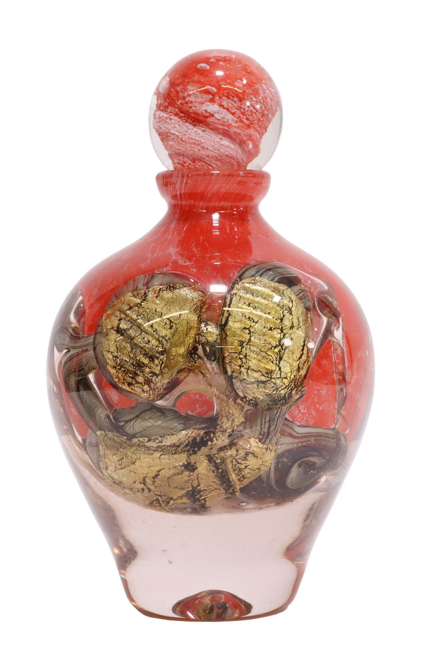 JEAN-CLAUDE NOVARO (D.2014) BLOWN ART GLASS BOTTLE: Studio blown art glass vase with stopper, signed J.C. Novaro (Jean-Claude Novaro, French, 1943-2014), dated 2006, internally decorated with red, gold, and grey inclusions, approx 8.5"h, 5"diam, 7lbs *