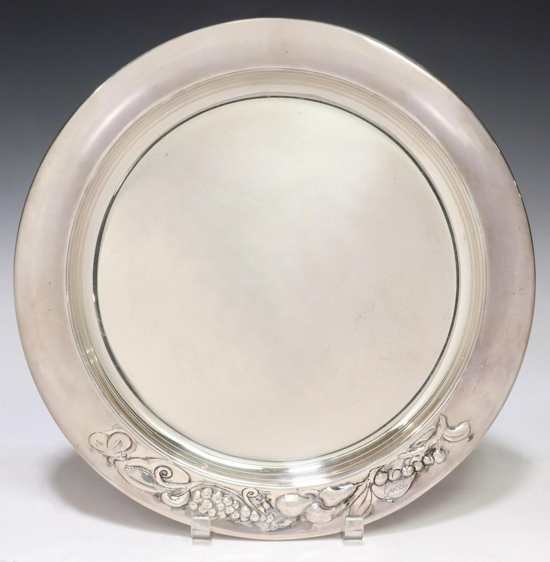 GUCCI SILVERPLATE 14" ROUND SERVICE TRAY: Gucci silverplate round tray, late 20th c., rim with fruit in relief, approx 14"diam, 2.5lbs (for shipping purposes only) Start Price: $150.00