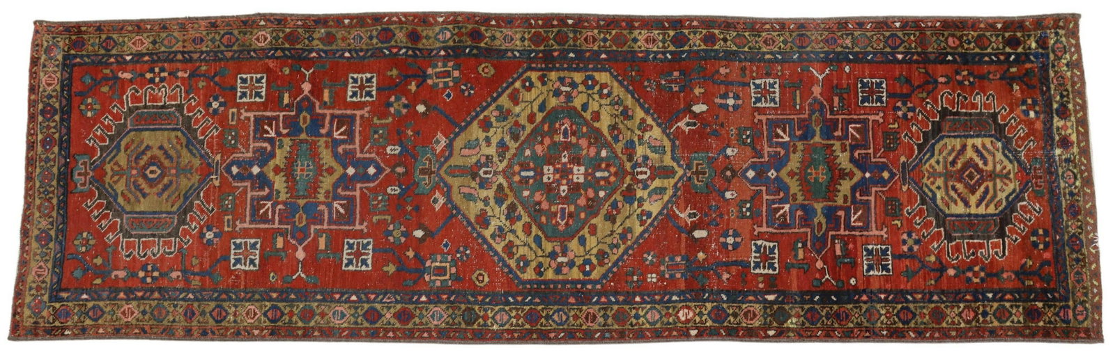 HAND-TIED PERSIAN HERIZ RUNNER, 8'9" X 2'10": Hand-tied Persian Heriz runner, approx 8'9"l, 2'10"w **Please Note: All of the rugs offered in this auction would likely benefit from a professional cleaning. Estate rugs may show some wear and imperf