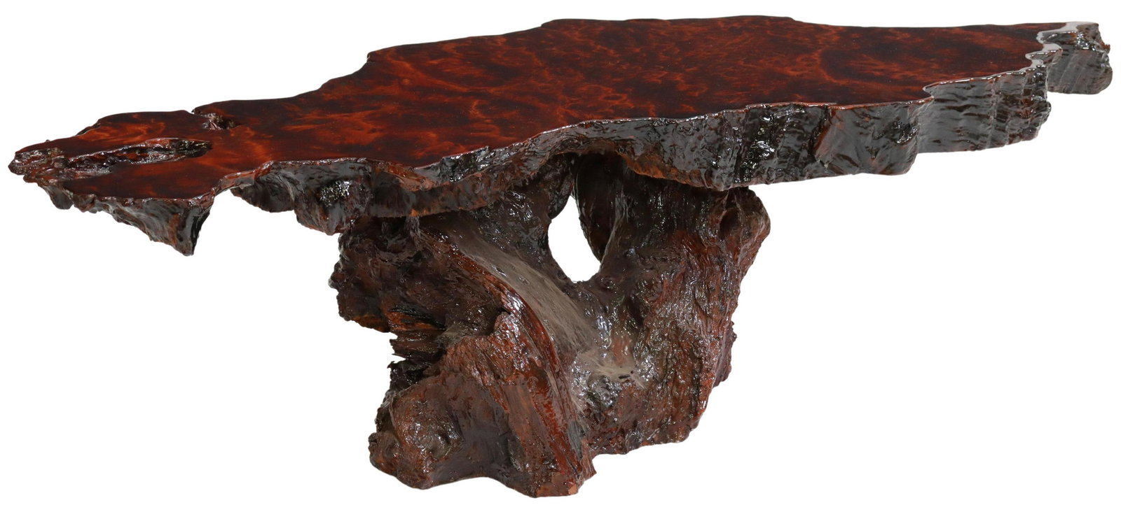 BURLED REDWOOD LIVE EDGE SCULPTURAL COFFEE TABLE: Burled redwood live edge coffee table, 20th c., having lacquered sculptural slab top, rising on naturalistic log supports, approx 17"h, 60"w, 16"d Start Price: $150.00