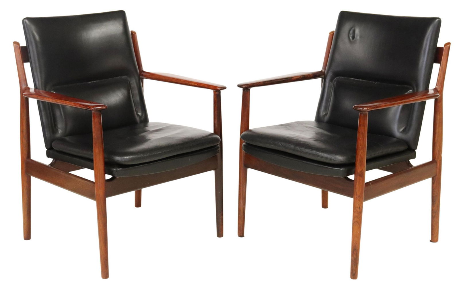 (2) ARNE VODDER (1926-2009) ROSEWOOD ARMCHAIRS: (pair) Mid-century modern rosewood armchairs, Arne Vodder (Danish, 1926-2009) for Sibast Mobler, c.1960s, black leather upholstery, contoured arms, rising on tapered legs, approx 34.5"h, 26.75"w, 24"d
