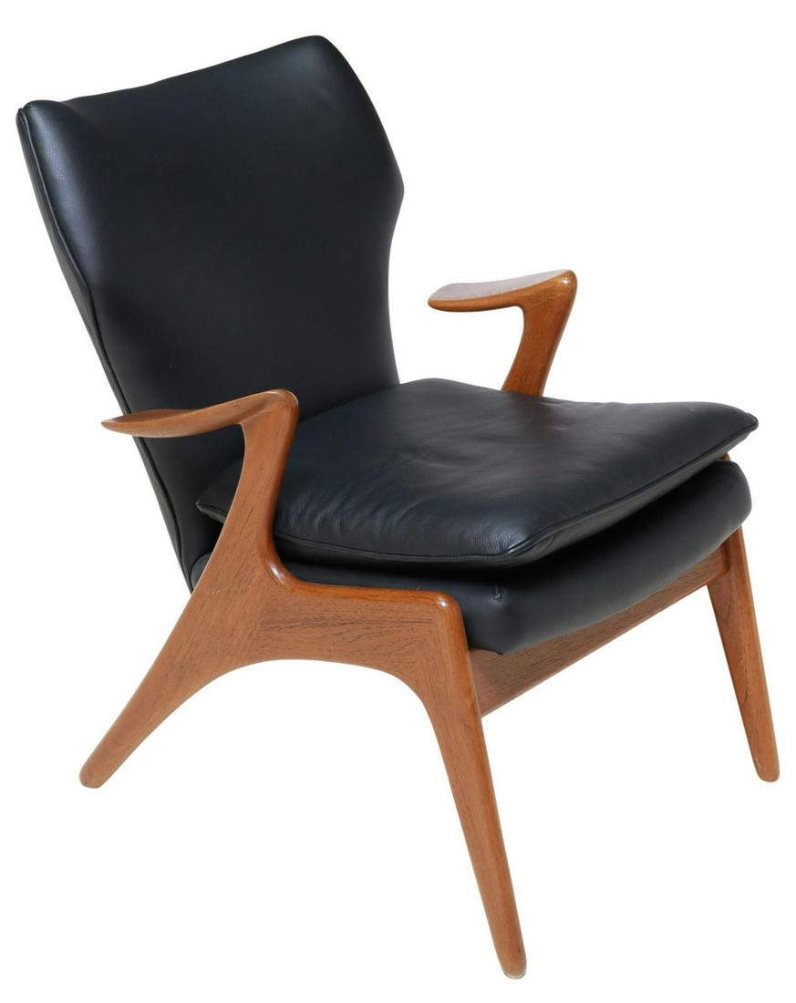 KURT OSTERVIG (1912-1986) SCULPTURAL LOUNGE CHAIR: Mid-century modern armchair, Kurt Ostervig (Danish, 1912-1986), c.1960s, black leather upholstery, sculptural arms, rising on tapered legs, no apparent labels, approx 33.5"h, 26.5"w, 27.5"d, seat heig