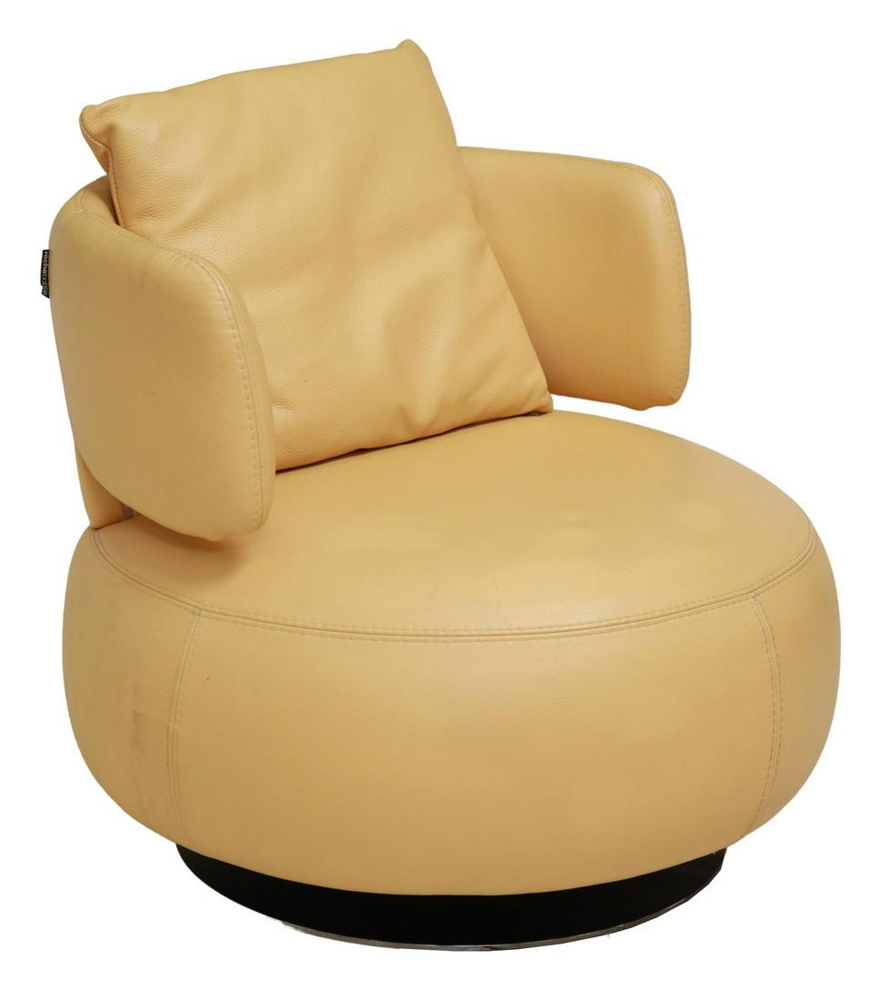 FRENCH ROCHE BOBOIS 'CURL' SWIVEL LEATHER ARMCHAIR: French "Curl" swivel leather armchair, Roche Bobois, original design by Roberto Tapinassi (Italian, b.1933) and Maurizio Manzoni (Italian, b.1967), having curved back over rotating circular base, in g