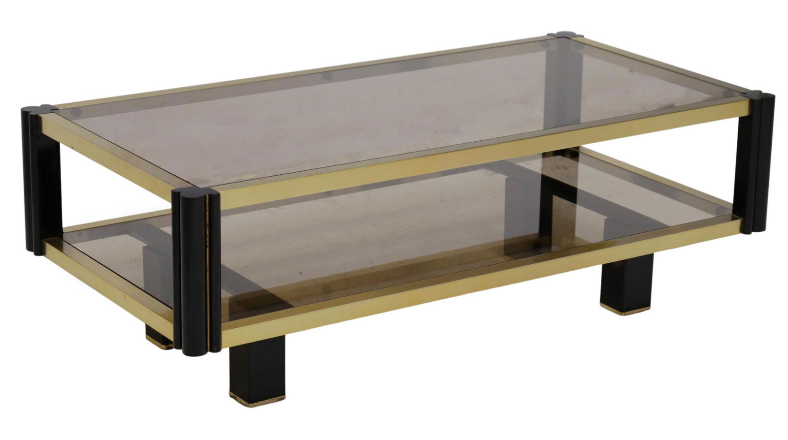 ROCHE BOBOIS BRASS & GLASS TWO-TIER COFFEE TABLE: French modern coffee table, attributed to Roche Bobois, c.1970s, brass and black lacquer frame, two smoked glass tiers, rising on square legs, approx 14"h, 40.25"w, 20.5"d **Provenance: from a high-en