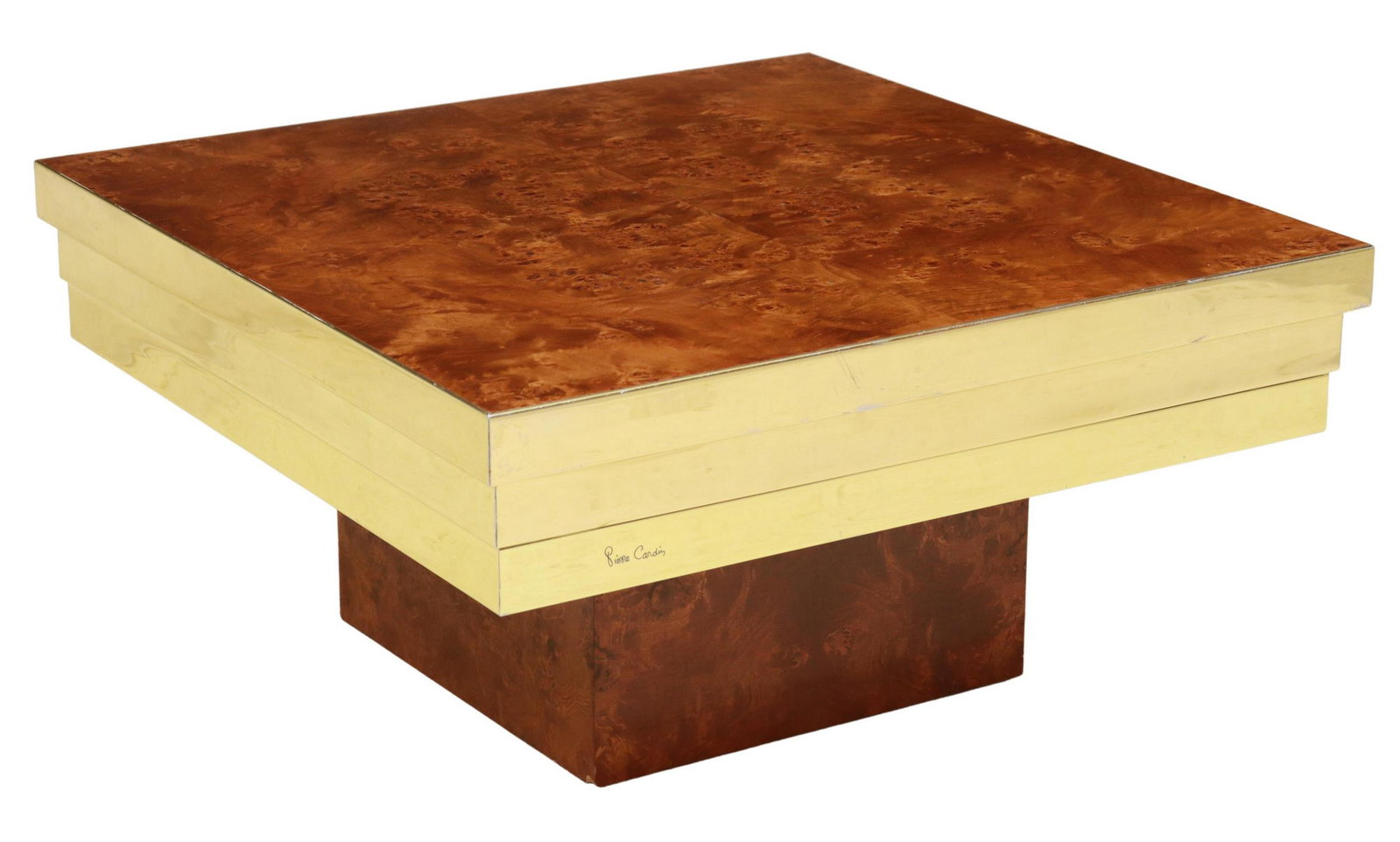 PIERRE CARDIN (1922-2020) MODERNIST COFFEE TABLE: French modernist burlwood and brass coffee table, Pierre Cardin (1922-2020), c.1970s, having graduated square top, brass-clad sides, rising on platform base, signed Pierre Cardin at side, small losses