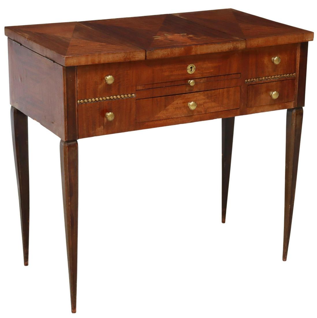 FRENCH ART DECO MAHOGANY MARQUETRY POUDREUSE TABLE: French Art Deco mahogany vanity/ dressing table, c.1930s, stylized floral marquetry, centered hinged top opening to beveled mirror plate, flanked by hinged side panels opening to storage, over pull-ou